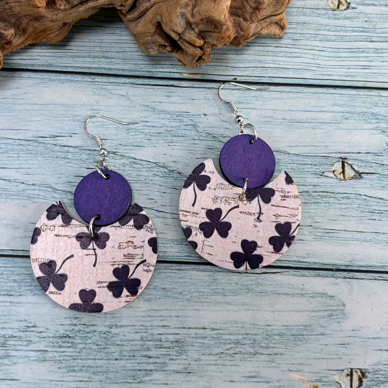 A Pair Of Printed Clover 's Day Spliced Round Wood Pu Leather Earrings