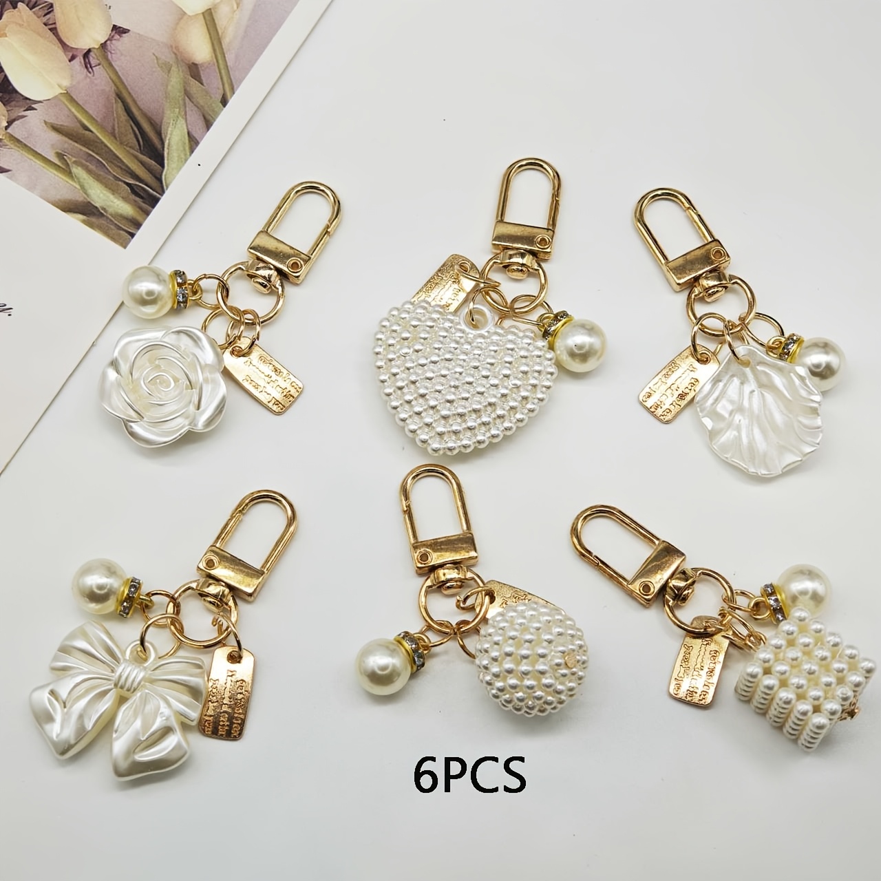 TEMU Ensemble de 6 pendentifs en perles avec cœur et fleur, étui pour écouteurs, breloques pour sac