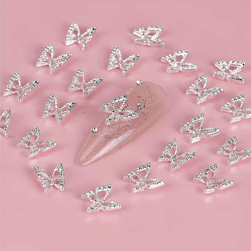 TEMU 50 stuks Zilverkleurige Uitgesneden Vlinderontwerp Legering Nagelkunstaccessoires