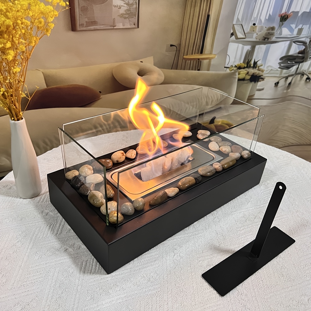 a rectangular alcohol fireplace with four glass panels designed for outdoor camping ambiance serves as a decorative piece for tables this portable fireplace is suitable for   indoor and outdoor use making it a great gift for housewarming and festive decorations   gardens   and patios details 1