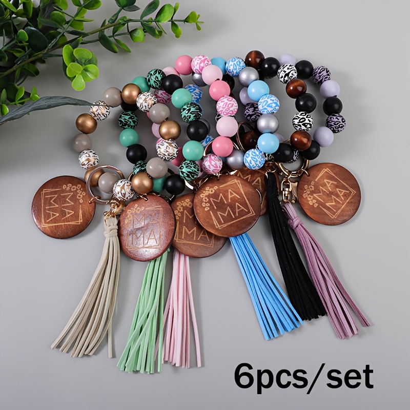 

6pcs/set Printed Wooden Beads Mama Wooden Plaque Charm Bead Wrist Key Ring Tassel Anti Loss Car Keychain Backpack Accessories Gift For Mom Day Holiday Gift