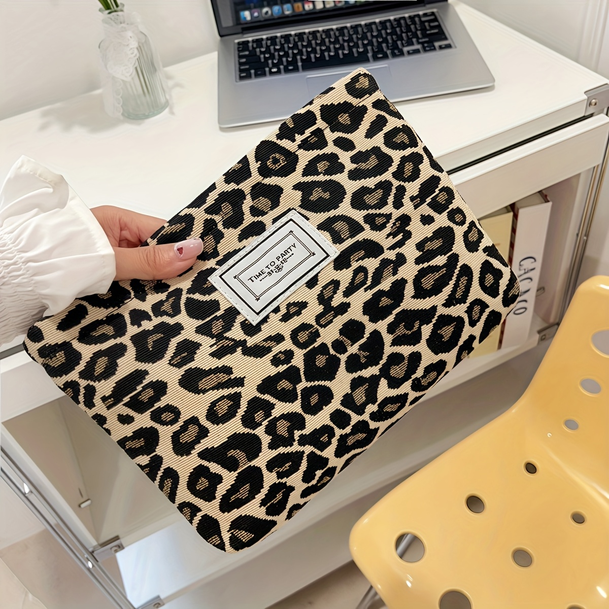 Image of A Stylish Leopard Print Makeup Bag For Storing Skincare Products, Makeup Brushes, Data Cables, Headphones, And , Perfect For Travel And A Great Gift For Women