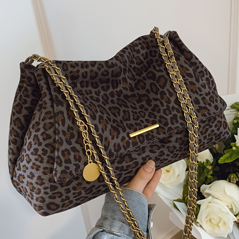 New Women's Fashion Trend Leopard Print Crossbody Bag with Delicate Strap and Elegant Golden Zipper. A Stylish Accessory for Commuting to Work, Shopping, Travel, Picnics, Camping, or Couple Dates. Ideal as a Gift for Loved Ones, Friends, or as a Coin