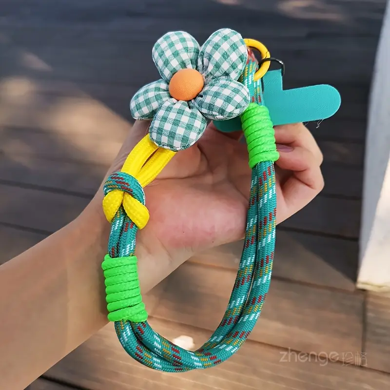 Foto de Strap/correa de mano adaptable a cualquier celular.