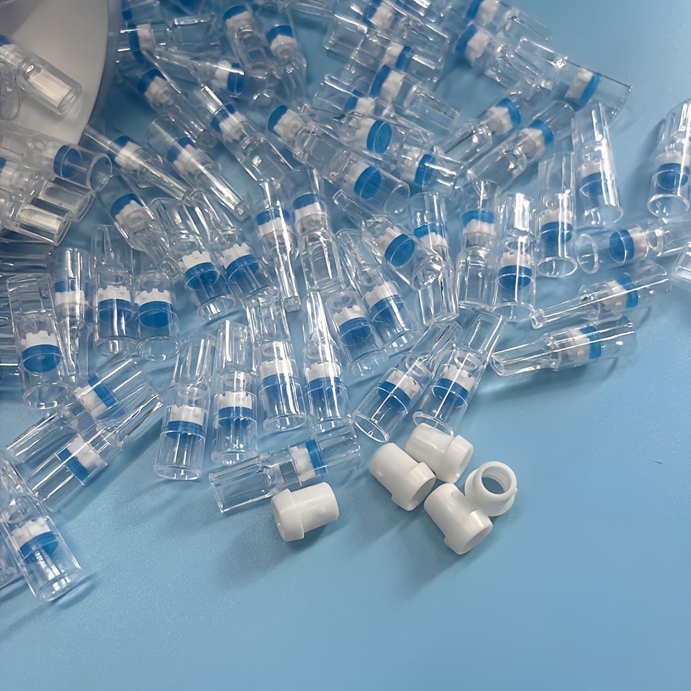 elementbilde to stiler: 300 stk og 100 stk, hver boks inneholder 100 stk. filtertips, hver boks leveres med 5 filteradaptere