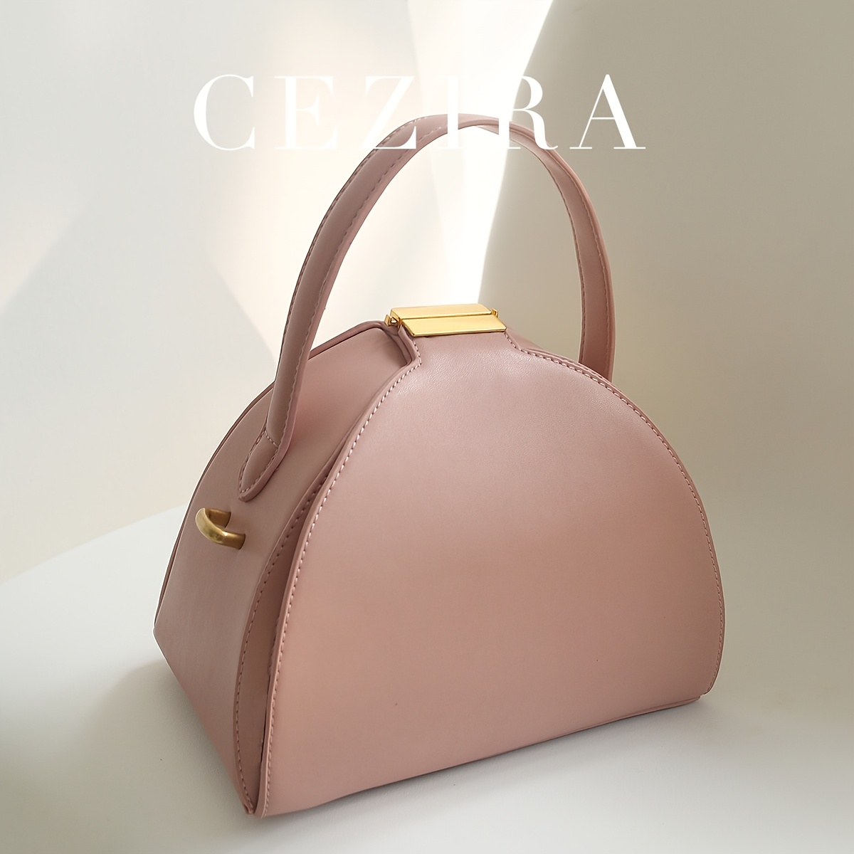 CEZIRA Women's Minimalist Elegant PU Vegan Crossbody Bag with Adjustable Long Strap & Top Handle, Squeeze Lock Closure, Box Shape Design - White & Pink, Versatile for Daily Commute, Work, Casual Outings, Crossbody Purse, Sleek Handbag, Travel Accessory, Modern Style, Highquality Finish, Compact Purse, Stylish Ladies