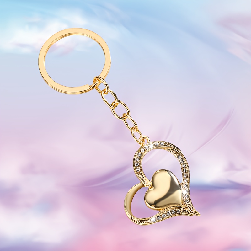 A Stylish And Minimalist Hollow Heart-shaped Keychain With Rhinestones, Perfect For Decorating Women' Keys, Bags, And As A Gift