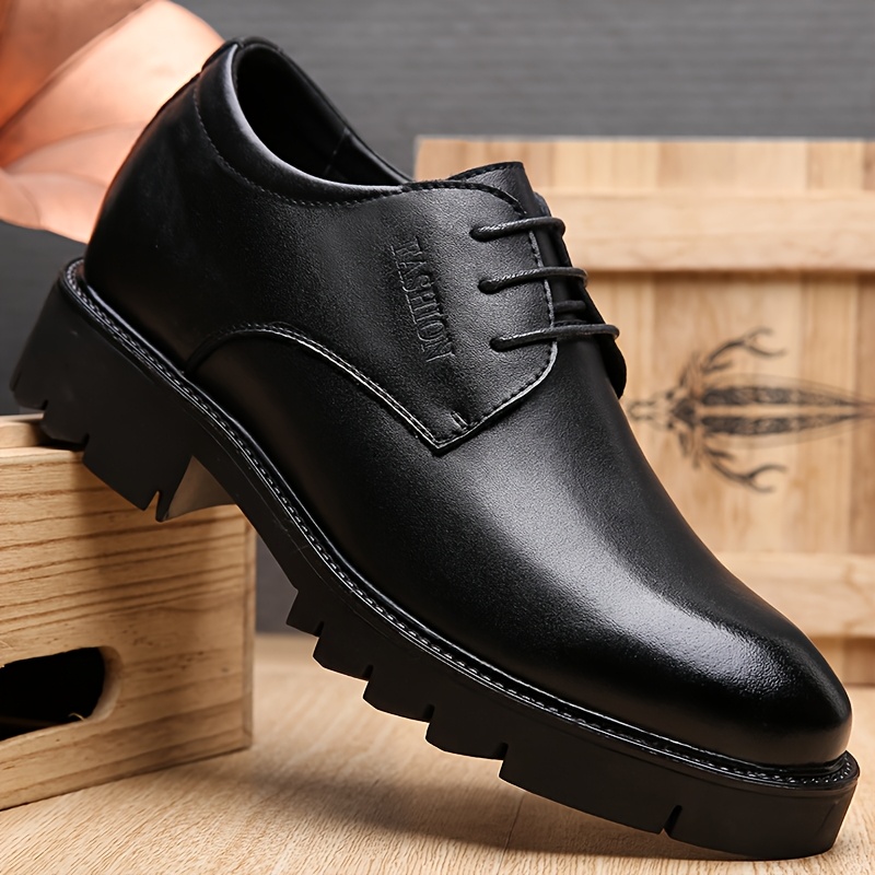 wingtip dress boots Black WINGTIP LEATHER BOOTS 7