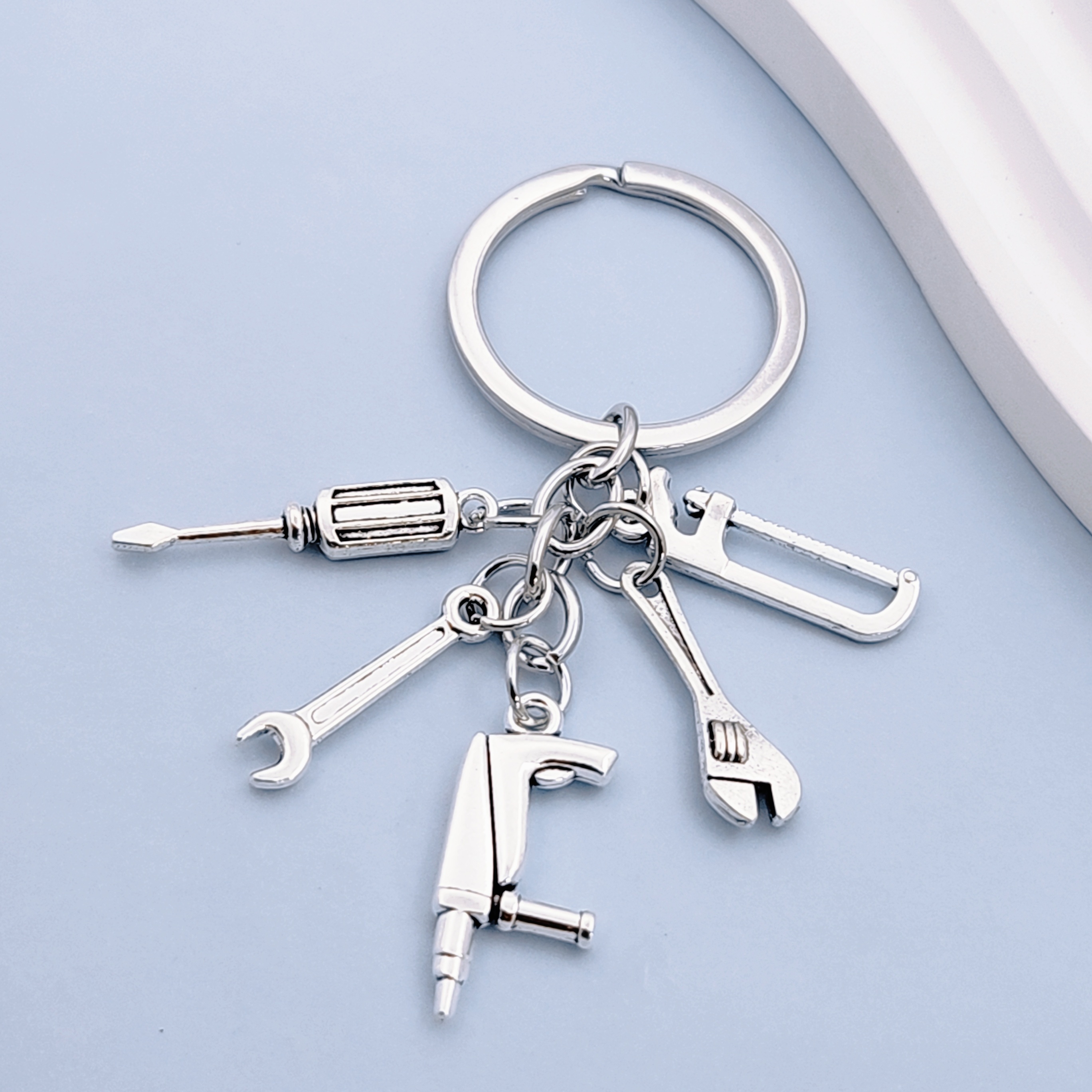 A New Keychain That Combines A Saw, Screwdriver, And , A Father's Tool Keychain, A Handmade Keychain, A Father's Day