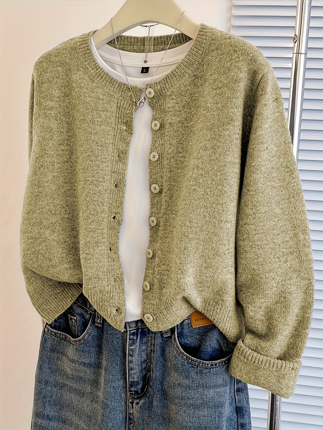 button front sweater sold on Temu United States