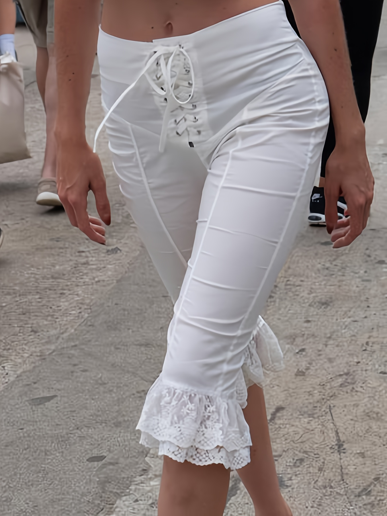 white ruffle hem crop pants