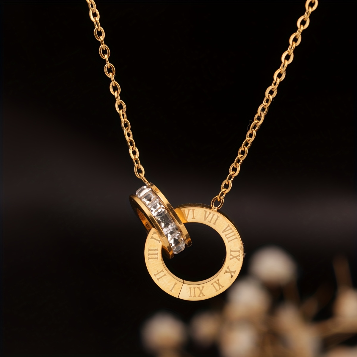 a stainless steel 18k golden plated roman     pendant with rhinestones and artificial crystals featuring a simple and     elegant and suitable for womens daily wear or parties perfect as a birthday gift or for Product details 4