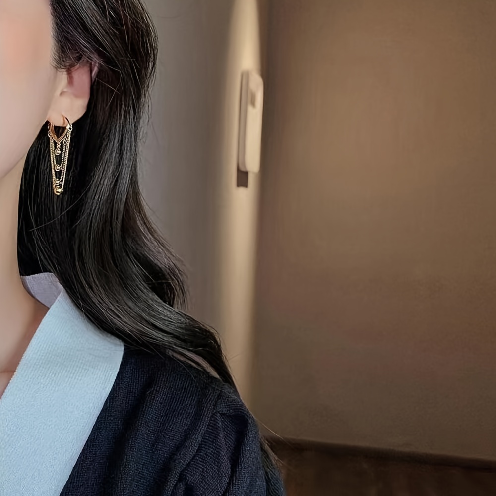 Stylish Tassel Earrings with Golden Sphere Pendant