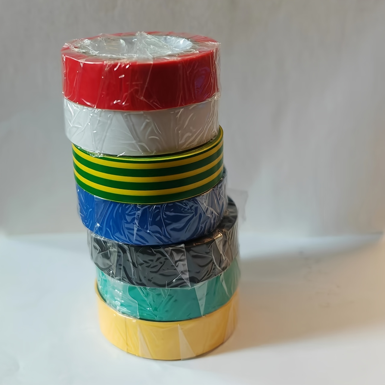 Image of Set Of 7 Rolls Of Multicolored Electrical Tape, Suitable For Pvc Insulation, Rated For 600v, Dust-resistant, Adhesive For Household And Automotive Wiring, Commercial Quality, And Flame-resistant