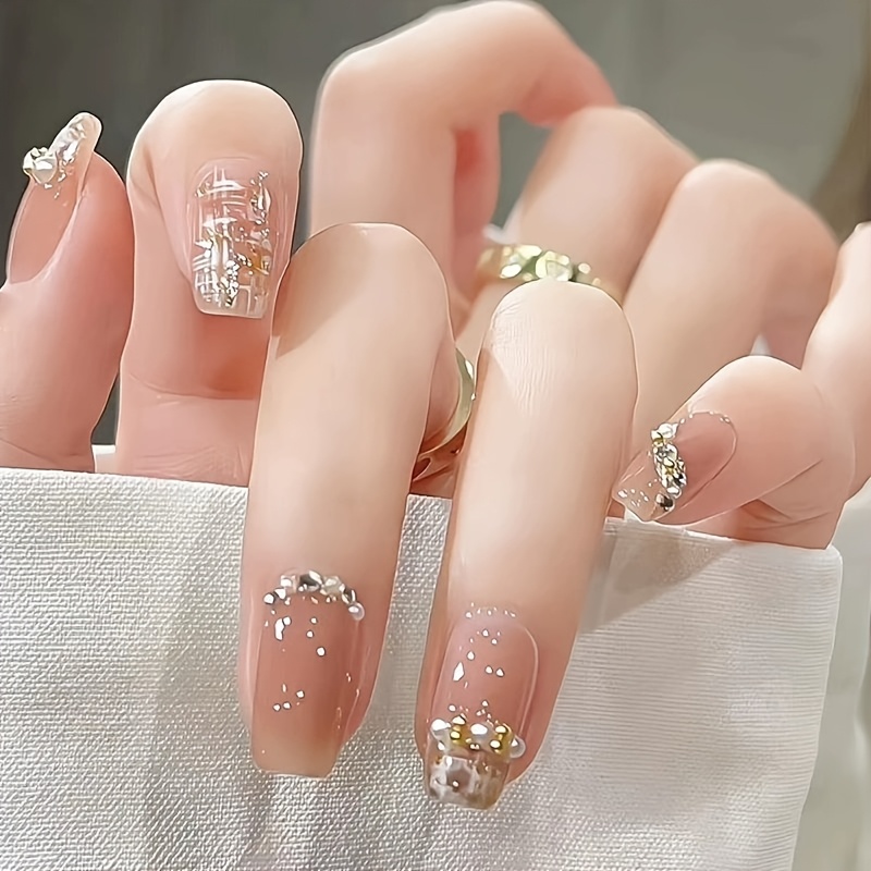 a set of 24 medium length   nails designed with rhinestones fully covering acrylic nails suitable for women and Product details 0