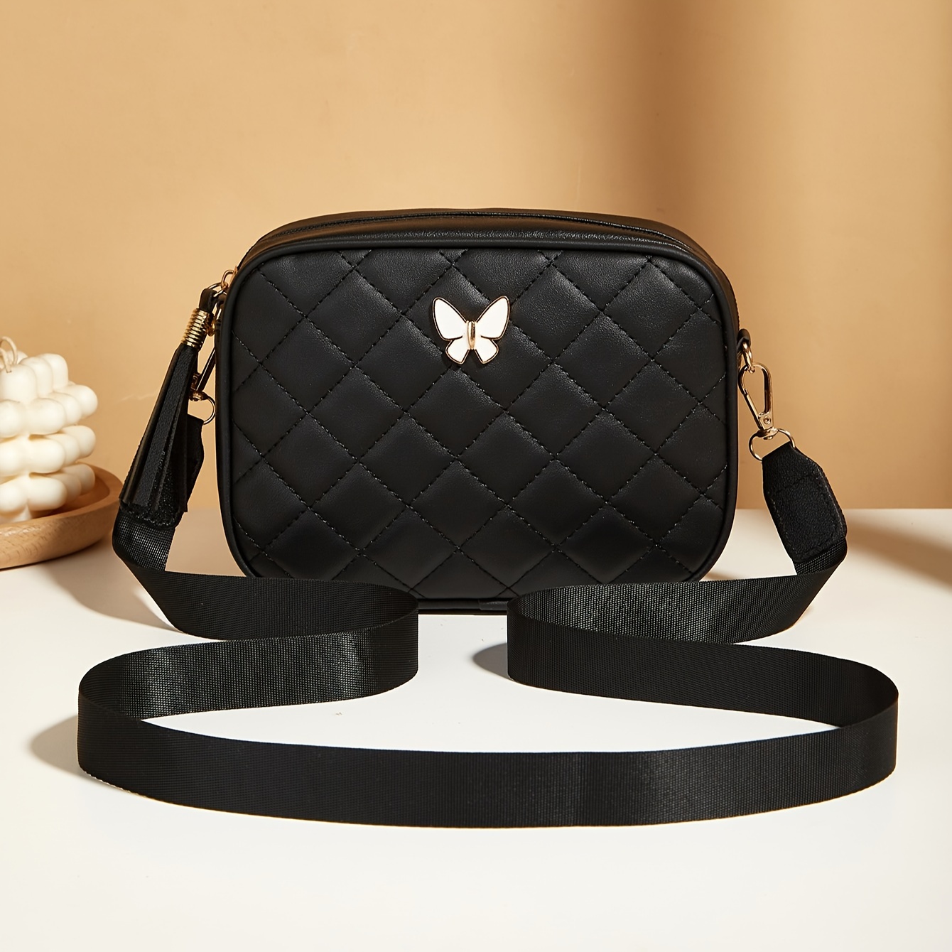 

Quilted Black Crossbody Purse With Tassel Detail And Golden Butterfly Charm - 14cm X 5.5in, 18.5cm X 7.27in, 6cm X 2.35in