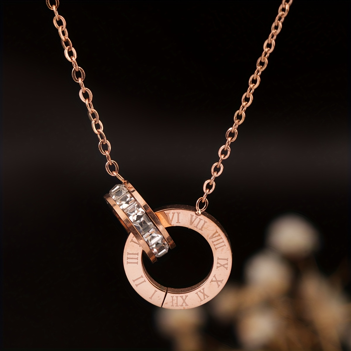 a stainless steel 18k golden plated roman     pendant with rhinestones and artificial crystals featuring a simple and     elegant and suitable for womens daily wear or parties perfect as a birthday gift or for Product details 5