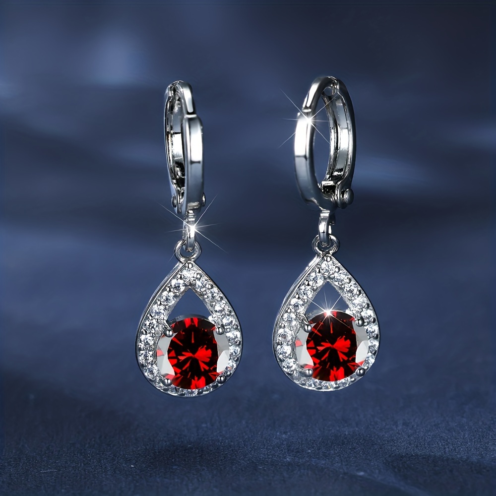 

Boucles d'oreilles pendantes plaquées cuivre élégantes et luxueuses avec pendentifs en de en synthétique