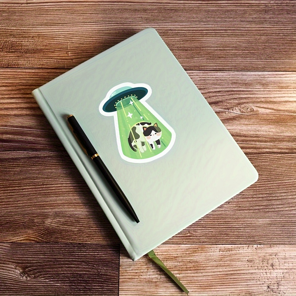 

Ufo Abducting Cat Vinyl Sticker – Decorative & Water-resistant Decal For Laptops, Notebooks, And Water Bottles, Major Material: Paper, Multipurpose Adhesive Desk Accessory