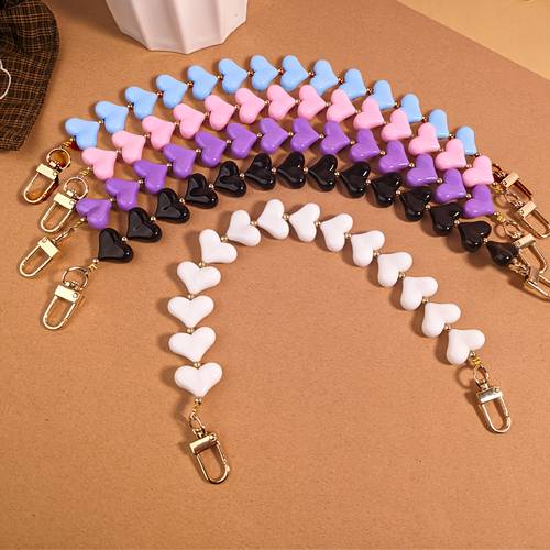 1pc of stylish solid color acrylic peach mobile phone lanyard handmade beaded phone strap with valentines day heart featuring pink bowknot charms and decorative bag chains for wallets and handbags