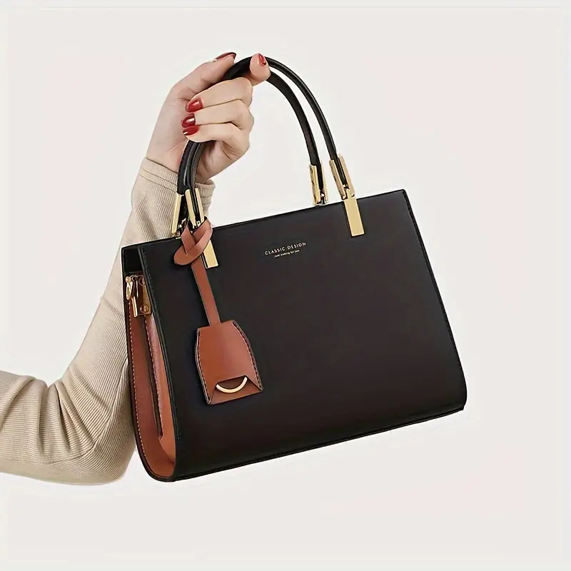 elegant genuine leather tote handbag by cobbler legend zip closure removable strap and tassel detail everyday use Product details 4