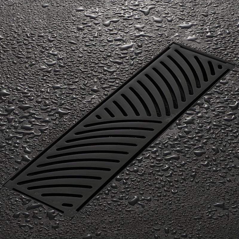 Black Stainless Long Floor Drain for Hotel Bathrooms, Rectangular Design with High Drainage Capacity, Elongated Hidden Odor-Proof Drain Featuring Wheat Ear Patterns