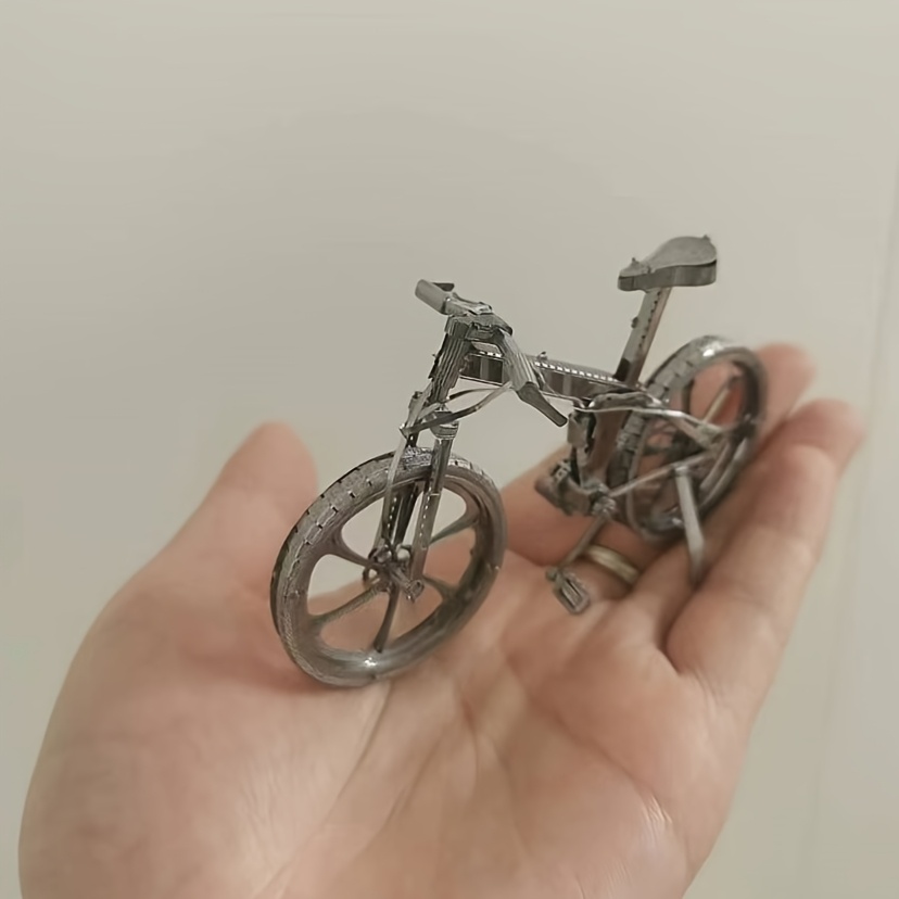 

A Diy Assembly Model Of A Golden Iron 3d Mini Puzzle, A Mountain Bike Model, A Christmas Gift, A Study Ornament Decoration, And A Handcrafted Puzzle For Exercise.