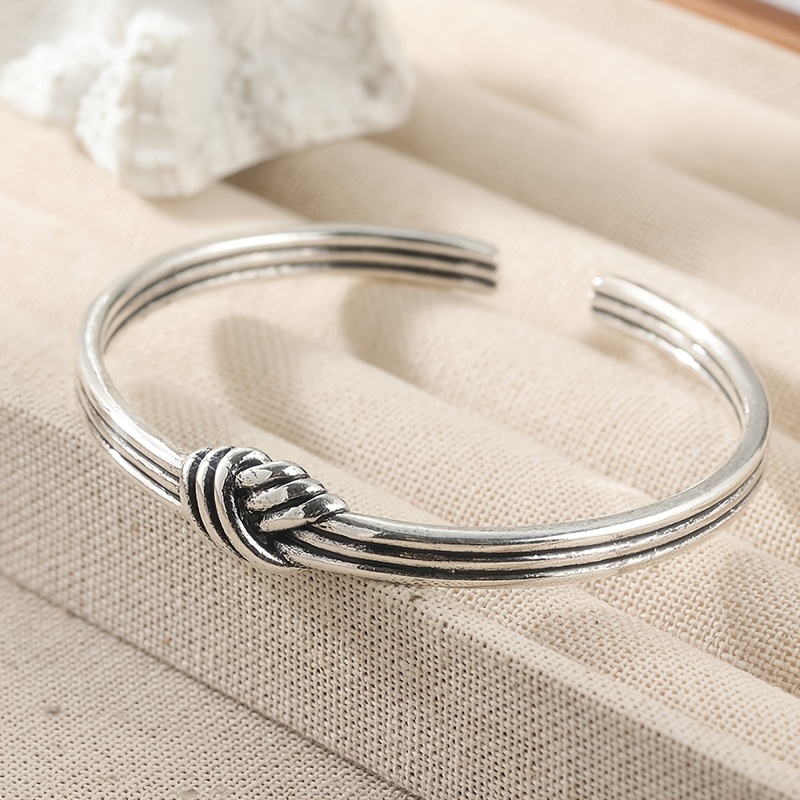 A Handcrafted Copper Bracelet Featuring A Minimalist And Rustic Design, With 3 Silvery Threads. Adjustable In Size And Makes A Perfect Gift For Anyone