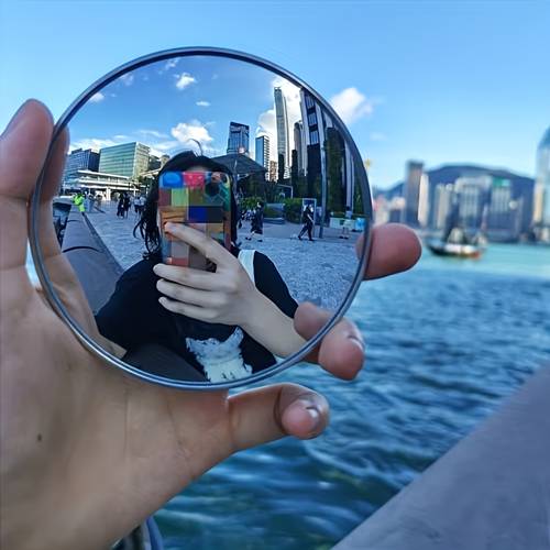 essential the small round for photo ops in large and small sizes it features a convex lens for wide angle shots making it a must have travel gift for friends a selfie accessory portable gear