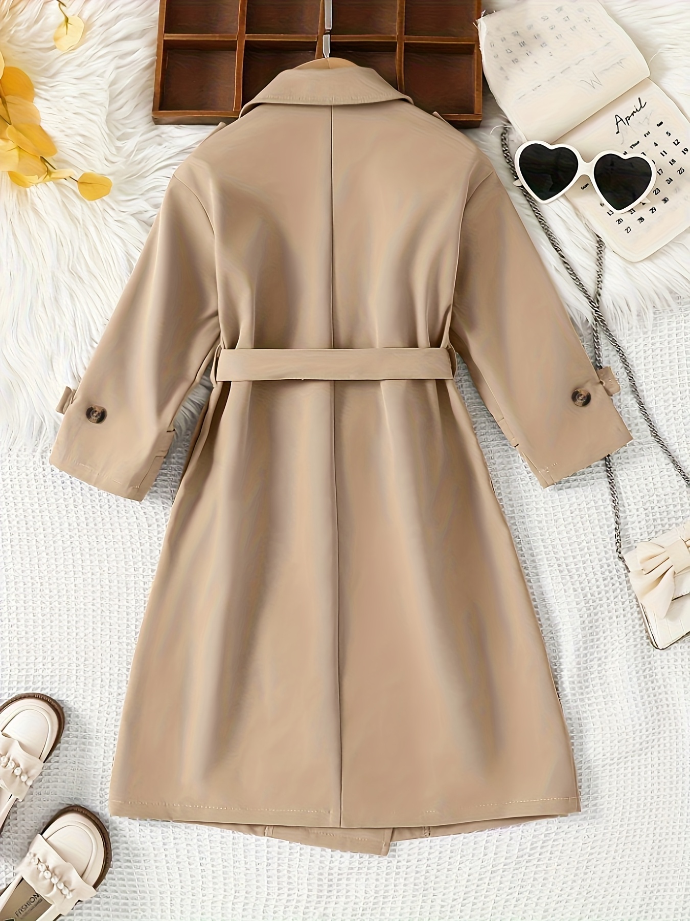 a stylish new autumn winter coat for girls featuring a fashionable double breasted design with a loose fit and a french style collar it   with a matching belt and is perfect for casual   parties and   outdoor activities Product details 2