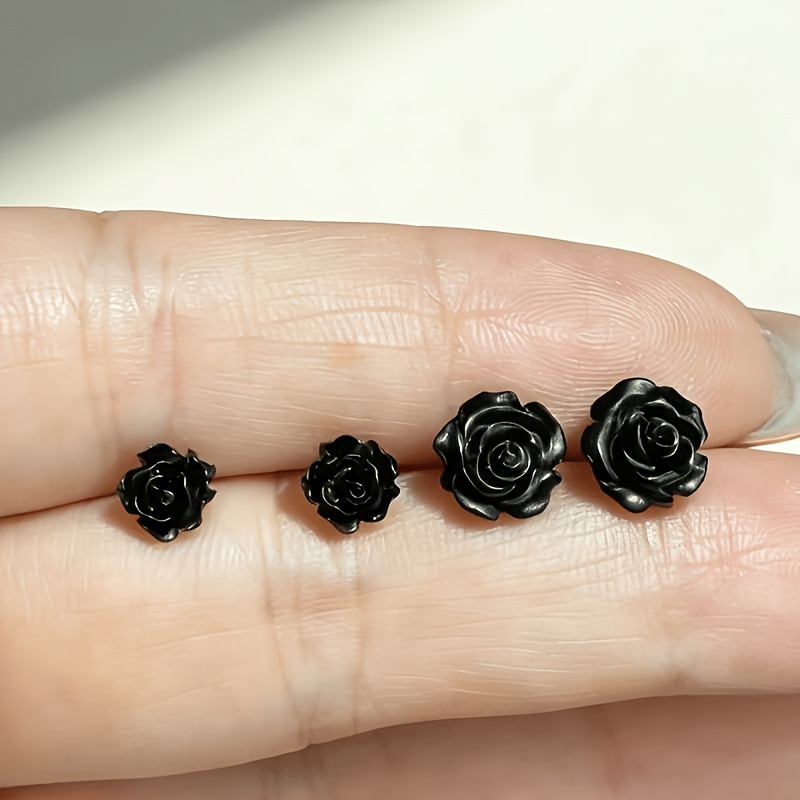Of Minimalist Style And Small Rose-shaped Earrings, Featuring Black Dark Tones. Each Earring Measures 0.6/0.8 Cm, Suitable For Occasions. Are Perfect As Unique Additions For Women' Or Party Outfits