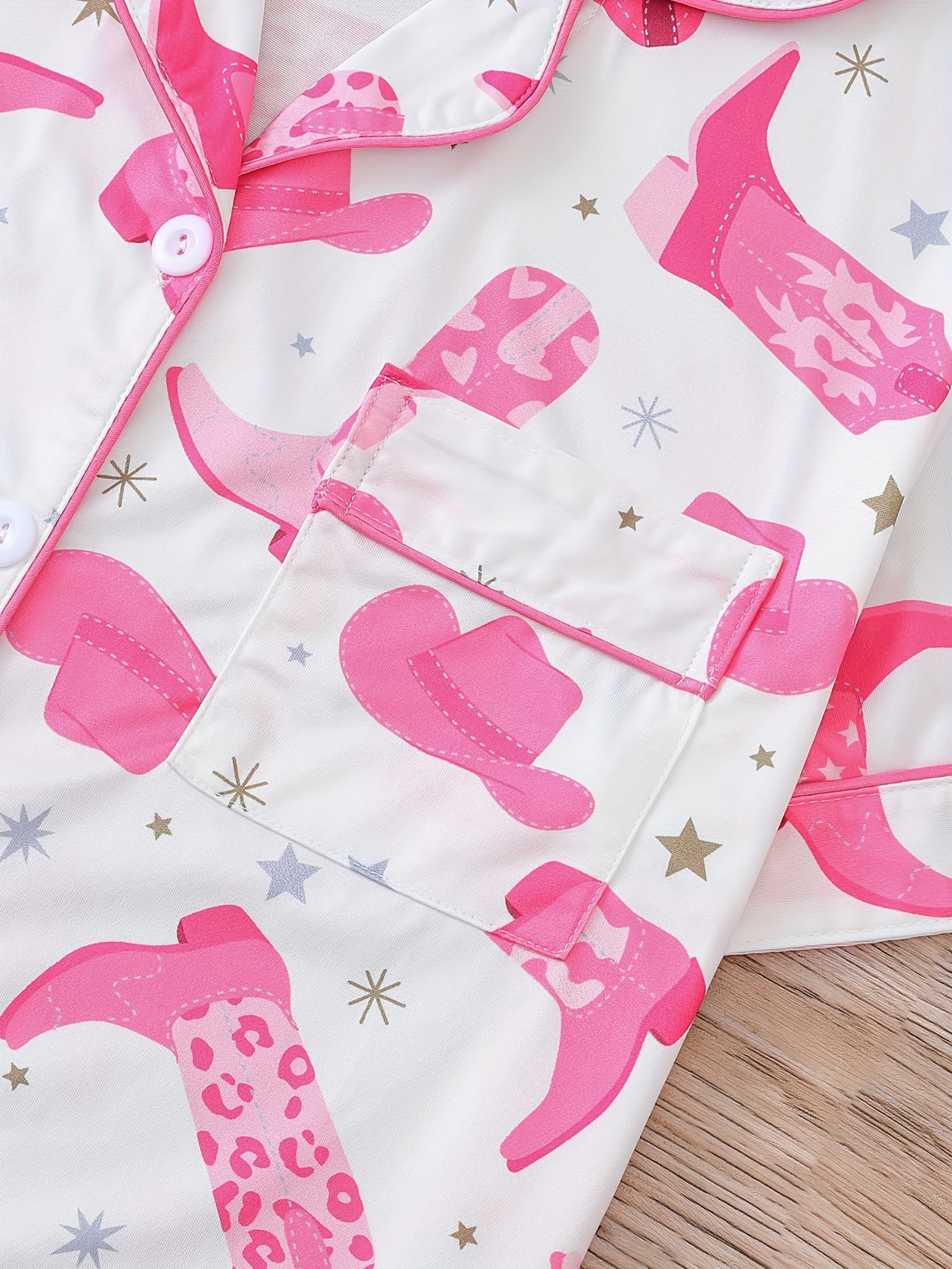 two sets of womens sleepwear sets   of womens sleepwear sets fabric short sleeved button up top and matching shorts full body print collar and pocket details suitable for womens adult sleepwear sets Product details 2