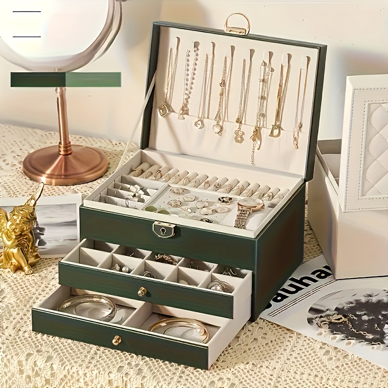 3 tier jewelry box organizer with key lock elegant green   lined compartments secure locking lid for earrings rings necklaces bracelets perfect gift for women home   decor durable synthetic   leather construction large jewelry box keepsake holder sophisticated design   leather   jewelry boxes Product details 0