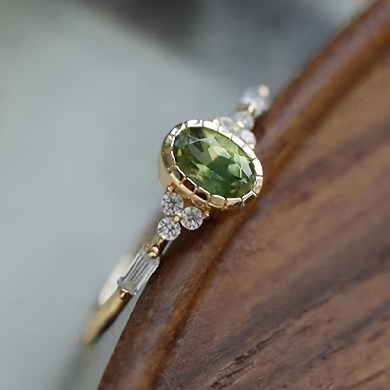 

1 bague de fiançailles pour femme, élégante bague vintage avec pierre précieuse synthétique jaune-vert de taille ovale, bijoux de fiançailles, de mariage, de banquet, accessoire de mode