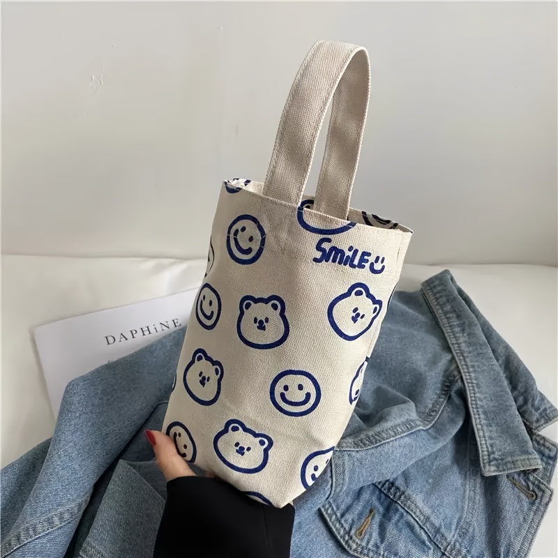 TEMU 【商品名】この可愛い花柄柄のキャンバストートバッグは、普段使いに最適で、水筒も入れられるサイズです。