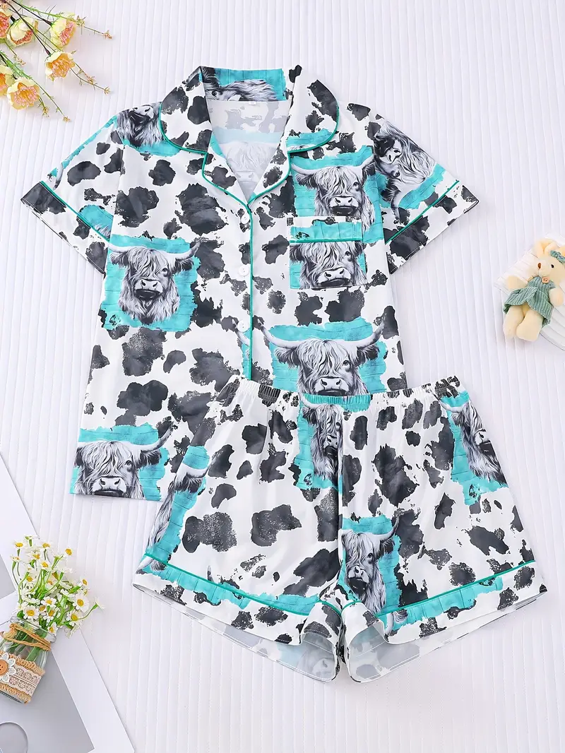 two piece womens white pajama set cow print fabric comfortable for short sleeved button top collar and matching shorts with full body print and pocket details suitable for adult pajama set Product details 0
