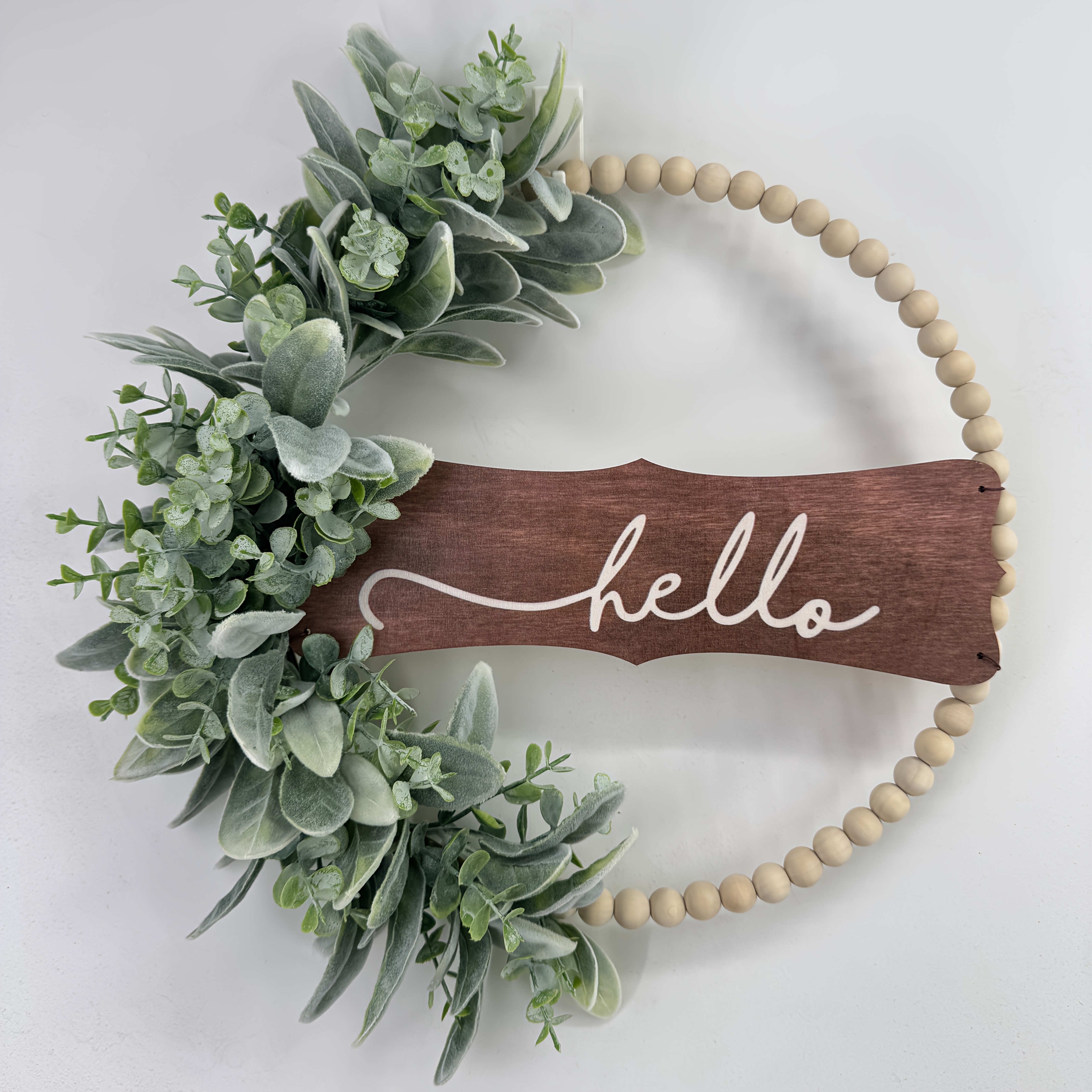 Hello, A Neutral Modern Wooden Bead Arch Wreath With Lamb's Ear Leaves, A Floral Decoration.