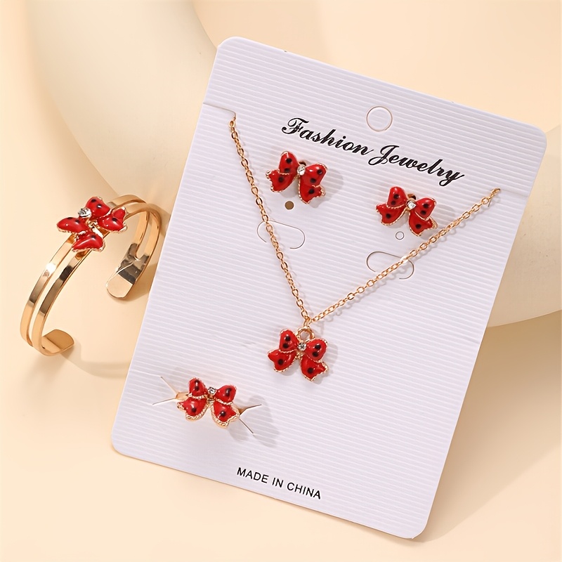 TEMU 1pc Collier et 1pc Bracelet et 1pc Bague et 2pcs Boucles d'Oreilles An Nœud Collier Bracelet Boucles d'Oreilles à Clous Ensemble Bijoux Filles
