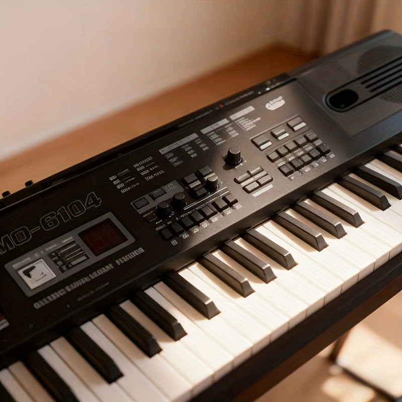 Popular Choice: 61-Key Multifunctional Electronic Piano, with 6 Preset Demo Songs, 16 Tones, 10 Rhythms, 8 Percussion Instruments, 2 Learning Functions, Sound Effect Control, Recording, Programming, Chords, Insert, Volume, Tempo, Digital Display