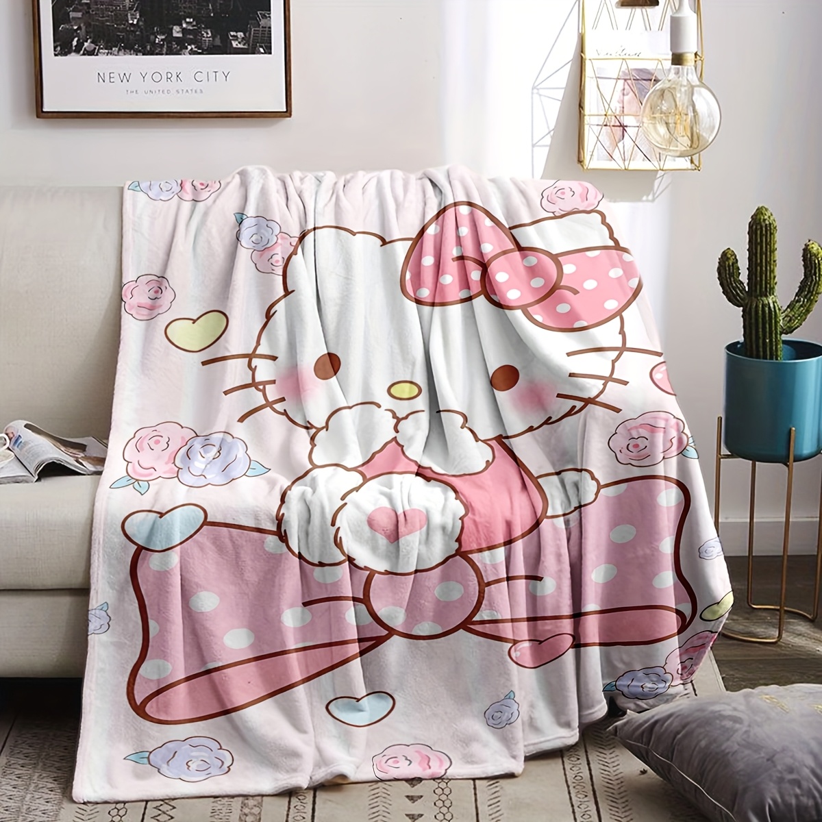 

A Pink Hello Kitty Blanket Featuring A Cute Cartoon Design - Soft Flannel Blanket For Use On Sofas, Beds, Cars, Offices, And Camping - A Gift For All .