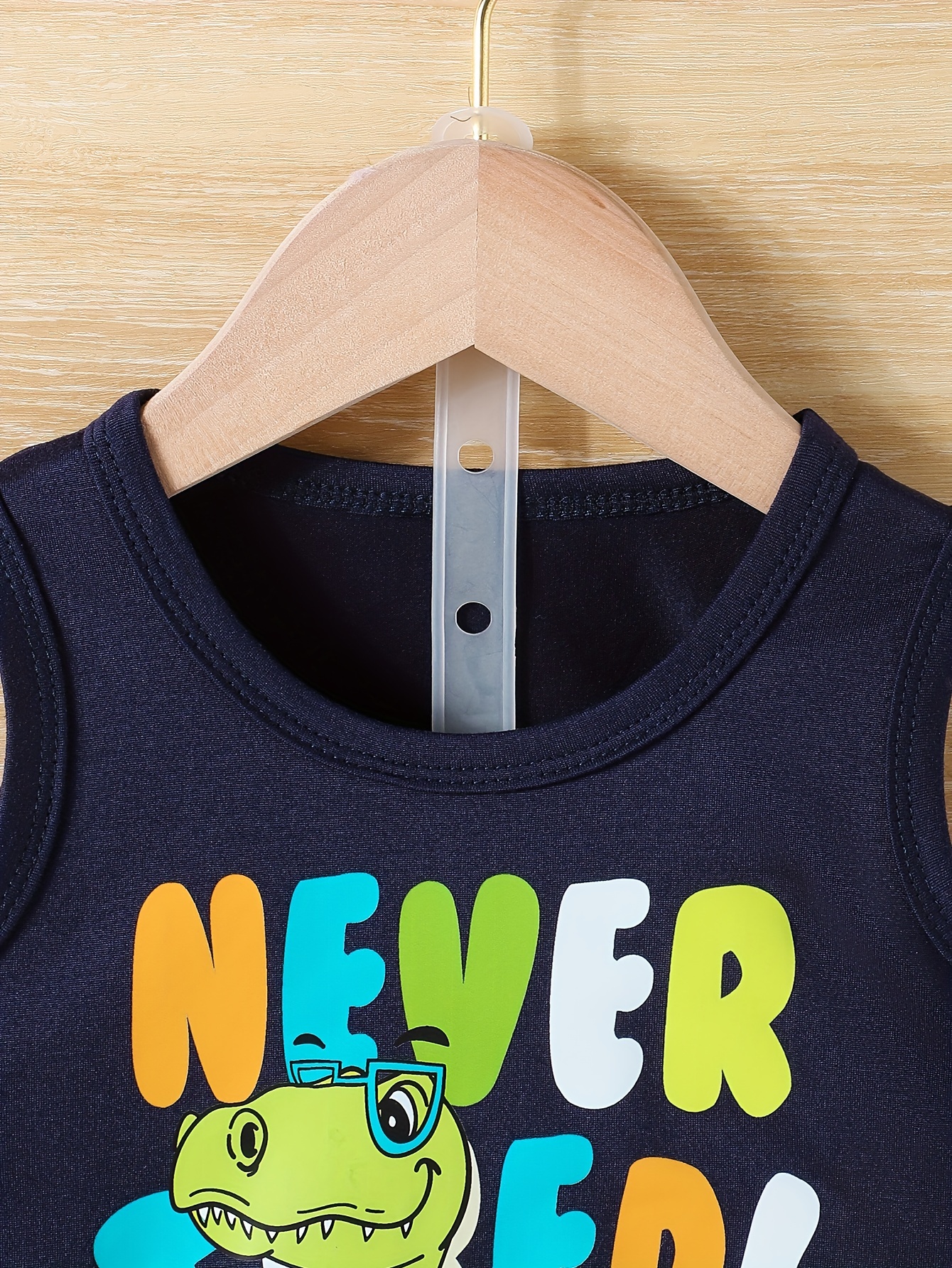 2pcs Baby Boy Allover Dinosaur Print Sleeveless Tank Top and Solid Shorts Set