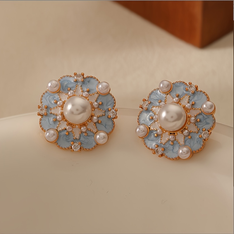 

Vintage Flower Earrings With Pearl Embellishments.