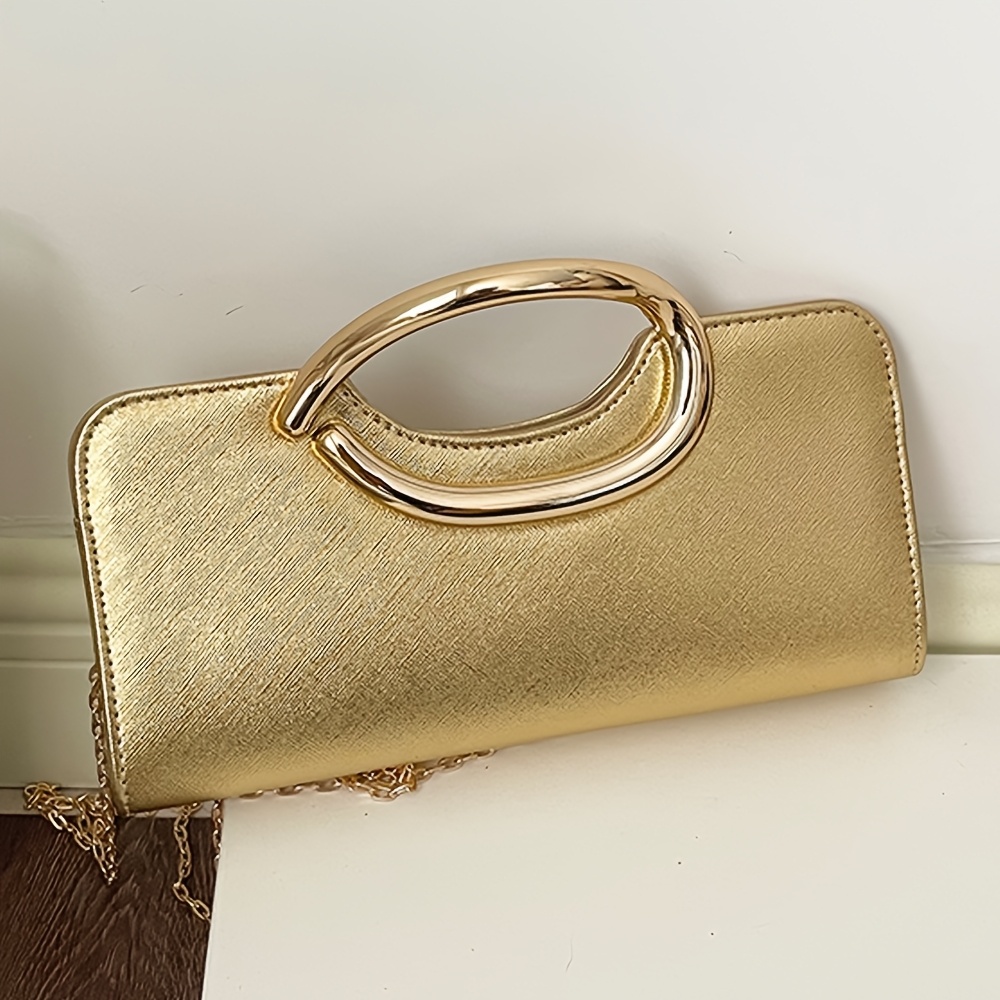 Elegant Metallic Handbag with Oval Metal Handle and Chain Strap
