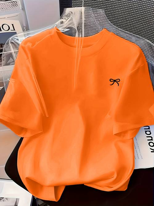 womens round neck design featuring a easy artistic bow pattern print casual and comfortable casual attire with a versatile short sleeve t shirt
