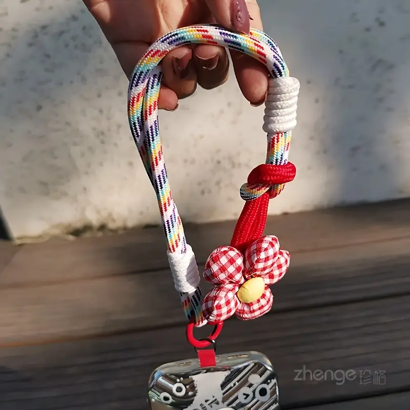 Foto de Strap/correa de mano adaptable a cualquier celular.