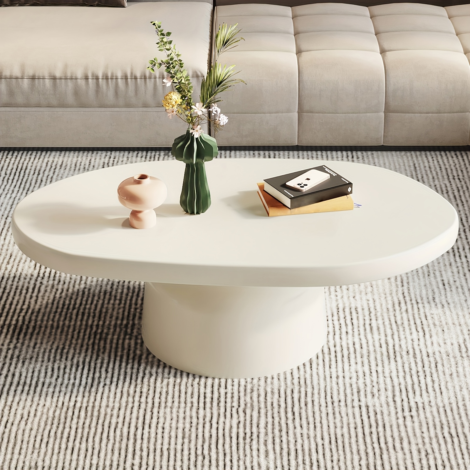 AModernCream-ColoredOvalCoffeeTableDesignedforLivingRooms,SuitableforBedroomsAndOffices,PerfectforSmallSpacesAndEasytoPutTogether