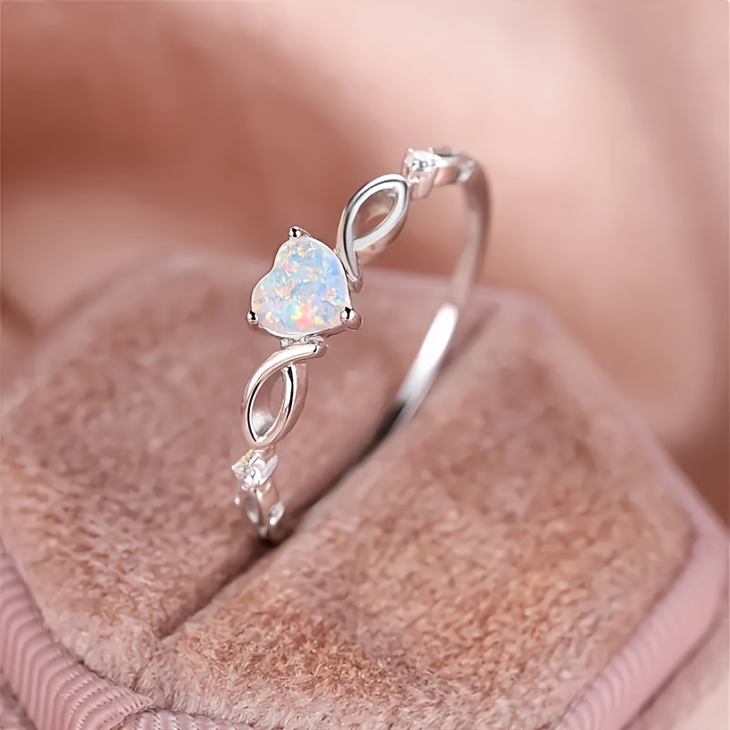 

The 925 Silver Heart, Shaped Opal Ring Exemplifies And Fashion Design For An Valentine's Day Gift.