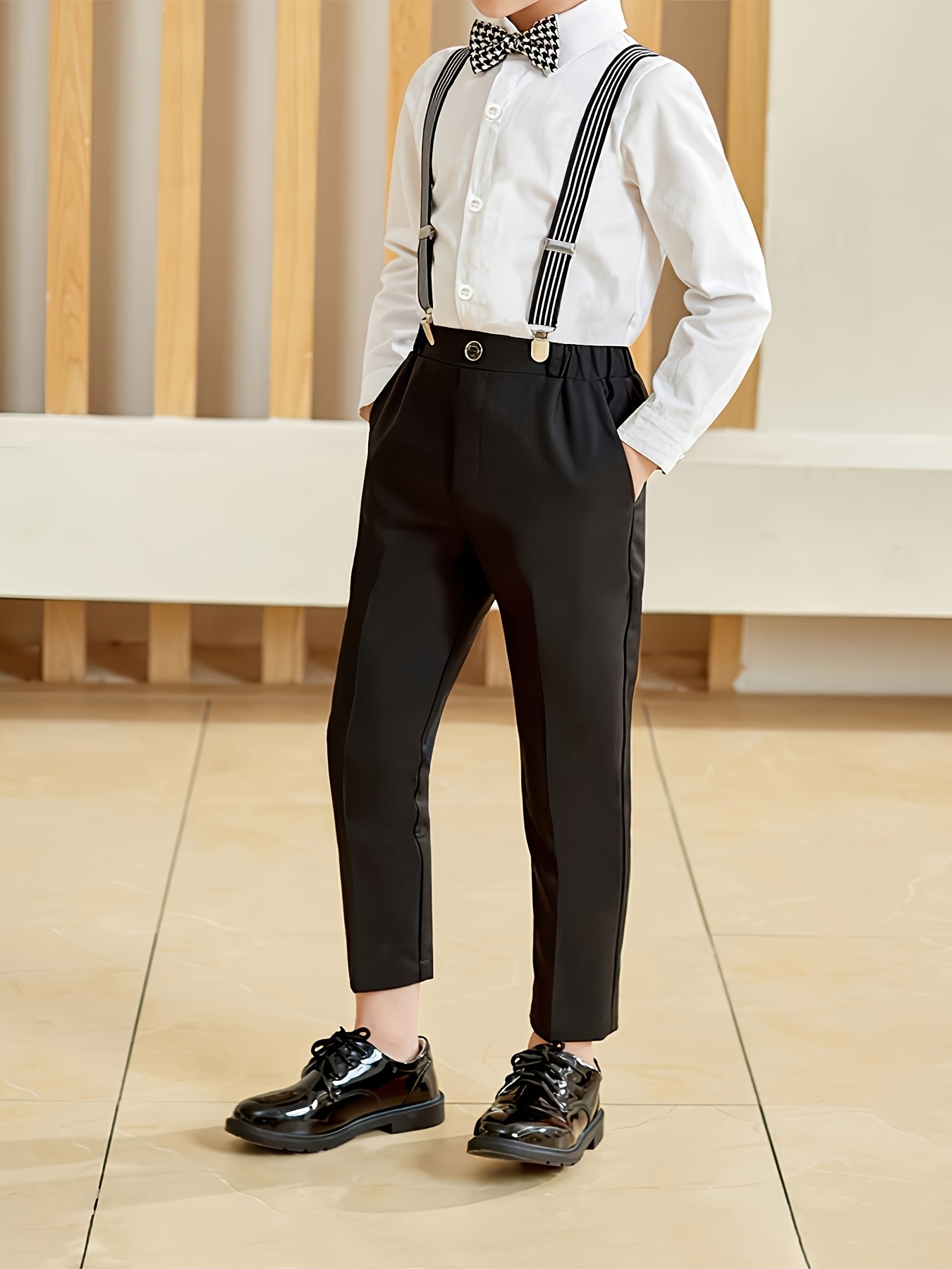 black dress shirt white suspenders The Mens Black Dress Shirt: Our Definitive Style & Buying Guide