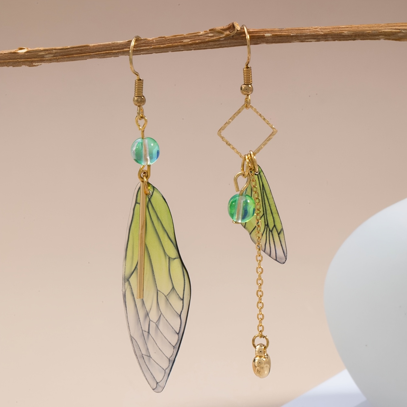 Image of A Summer Fashion Gradient Wing Women's Earring With Contrasting Asymmetrical Earrings Suitable For Outdoor Play, Picnicking, Beach Vacation