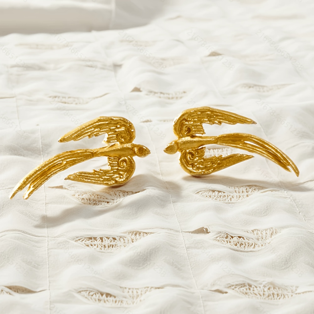 TEMU Une paire de clous d'oreilles tendance pour femme, boucles d'oreilles estivales à texture sculptée avec motif d'ailes d' , boucles d'oreilles au